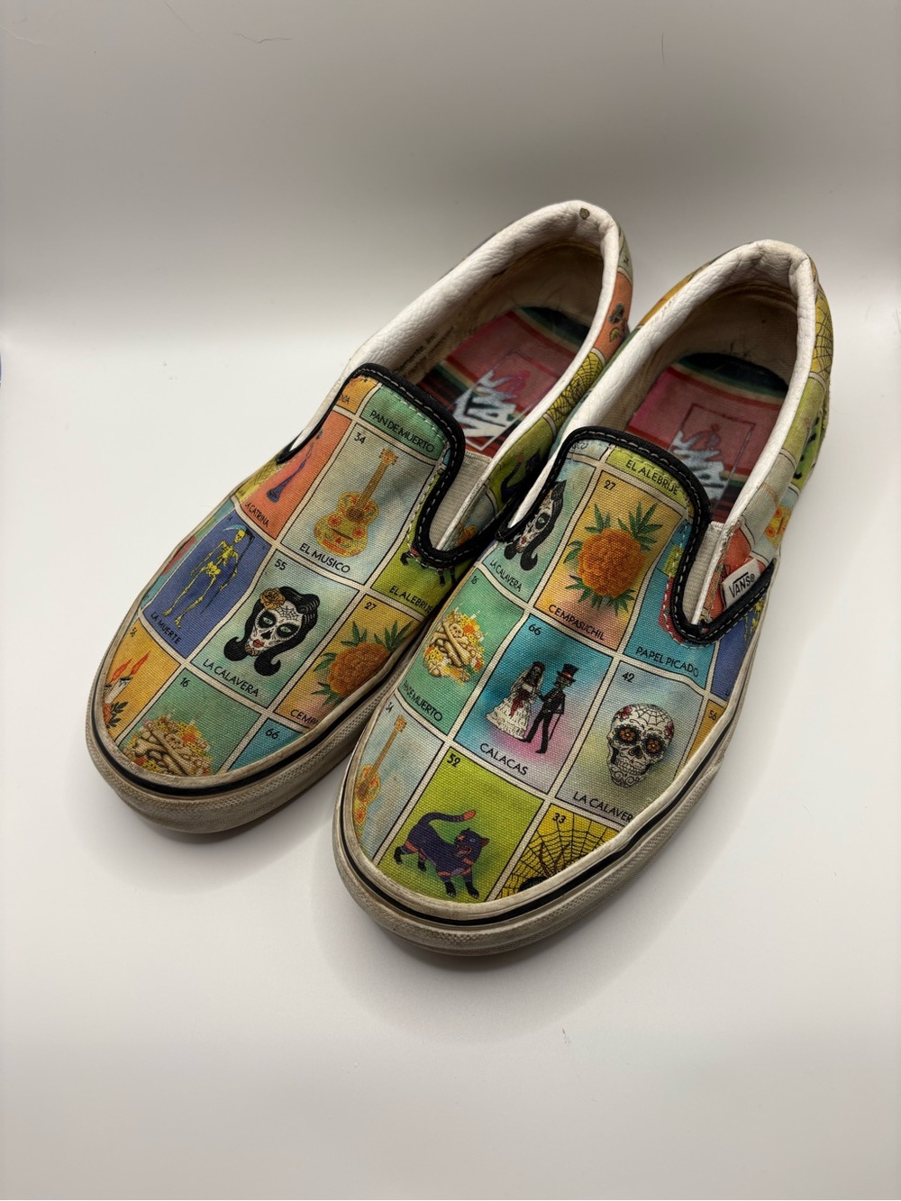 Women’s size 8 Men’s size 6.5 Vans Lotería slip ons
